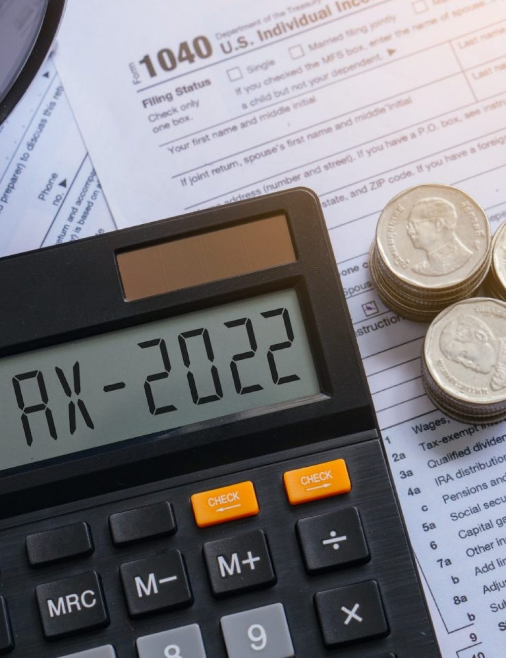 tax-word-and-2022-number-on-calculator-pay-tax-or-vat-in-2022-years-business-and-tax-concept--e1670796158401.jpg
